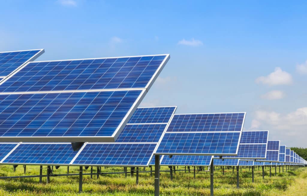 photo of solar panels against blue sky