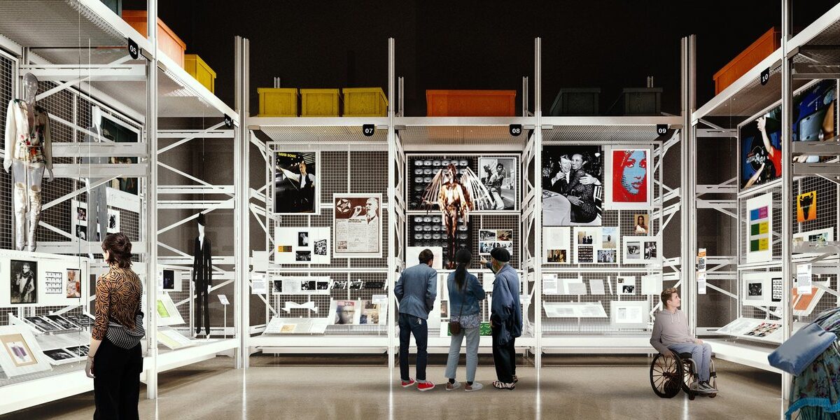 Image showing people browsing a collection of David Bowie articles in a modern, warehouse-like room with open displays